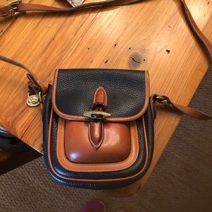 Vintage Dooney and Bourke single pocket outback